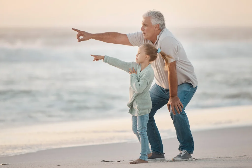 Grandparent and grandchild enjoying financial security through long-term retirement planning.